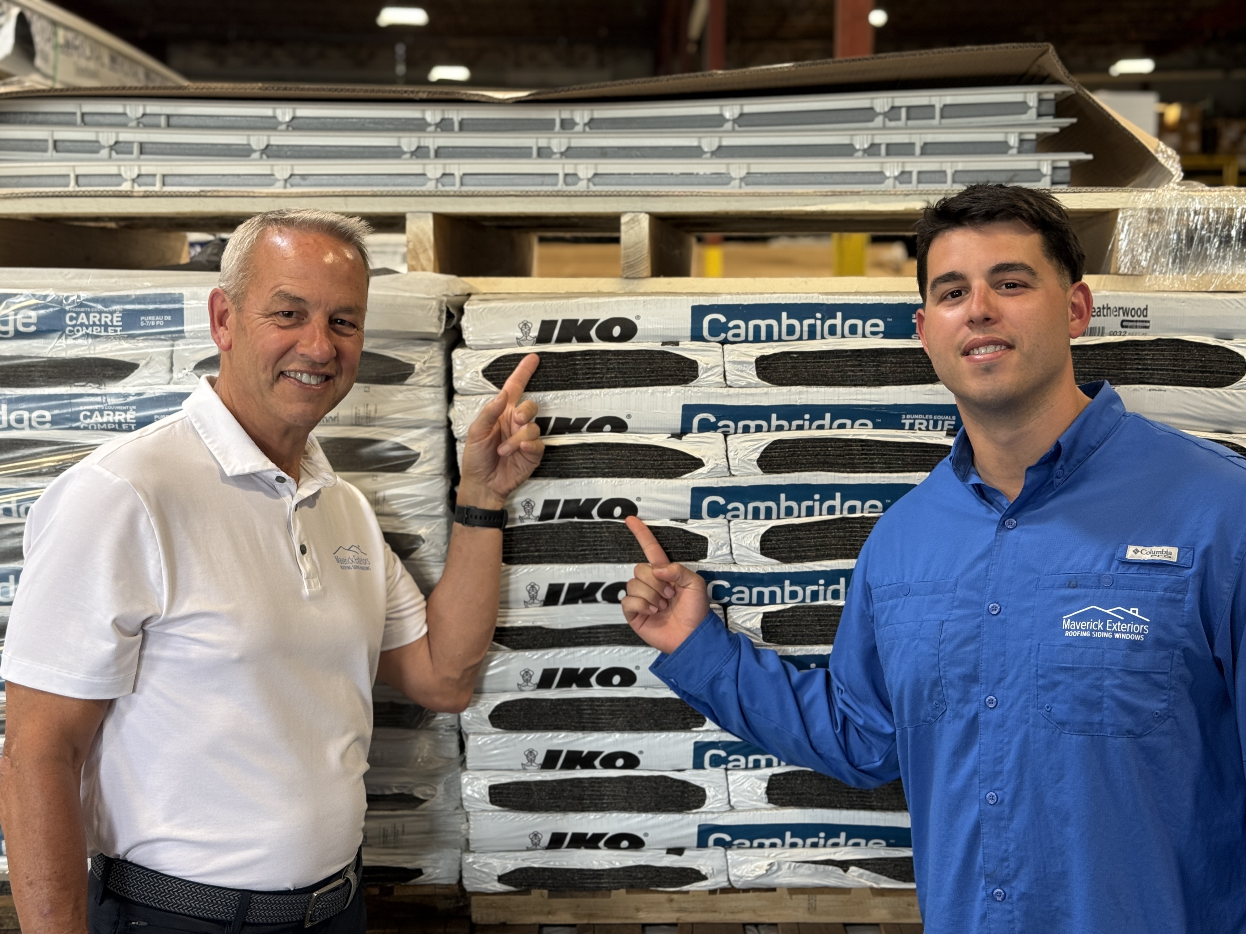 Maverick Exteriors team reviewing roofing materials